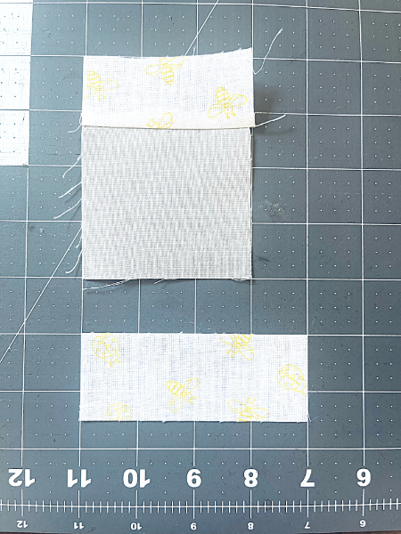 fabric pieces on cutting mat