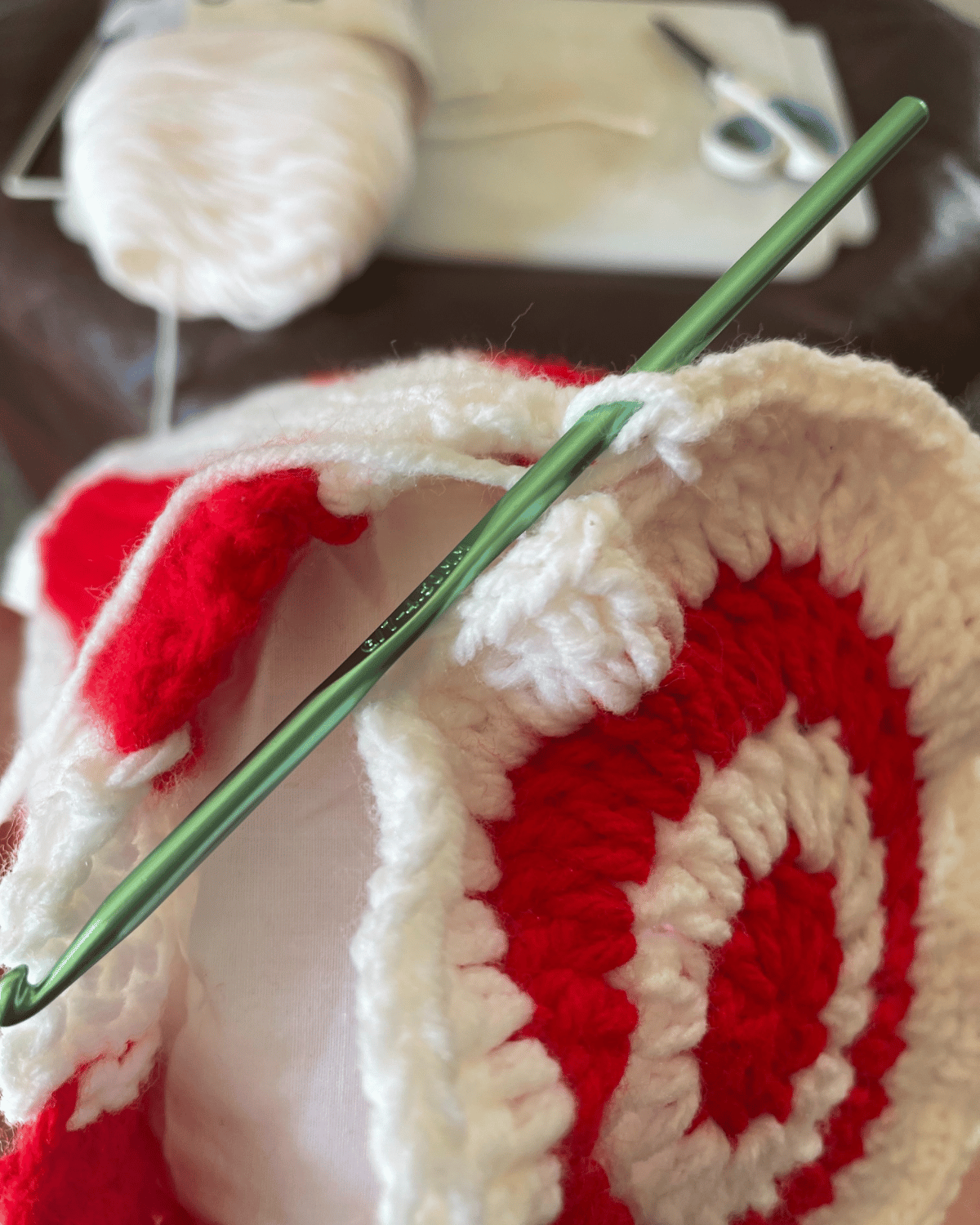 Connecting the pillow cover ends to the body panel of the Candy Cane Pillow by Sew Nikki