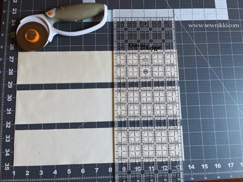 Measuring and cutting quilting fabric on cutting mat