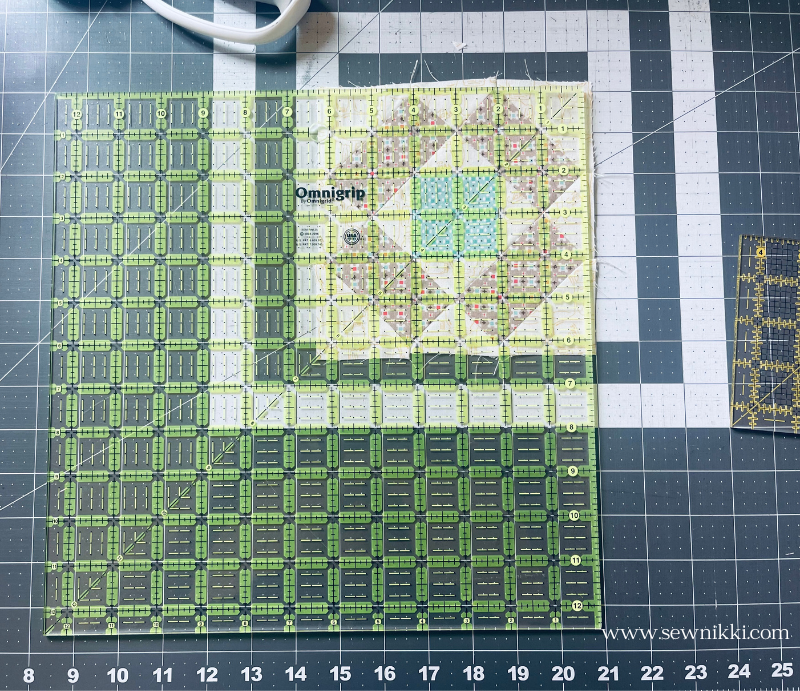 12.5" square quilting ruler on cutting mat