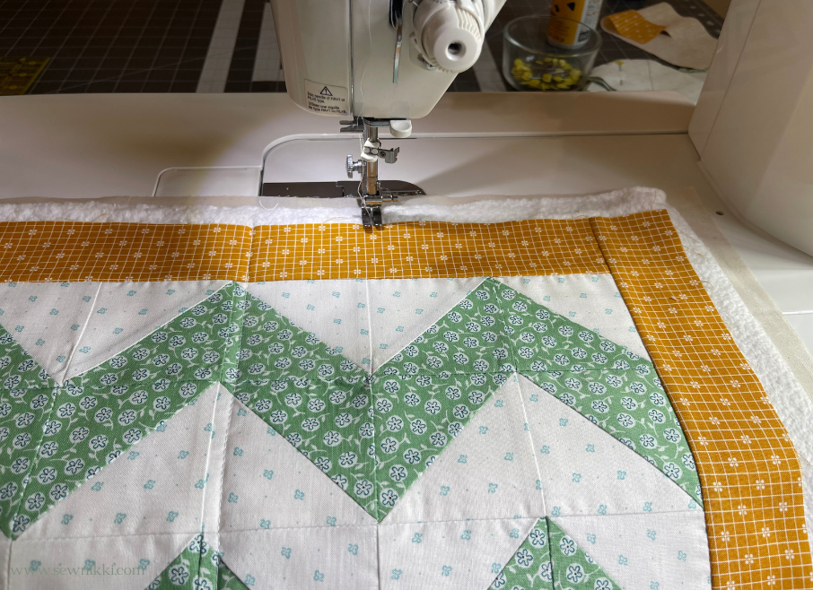 Chevron quilt pattern, machine quilting with straight lines