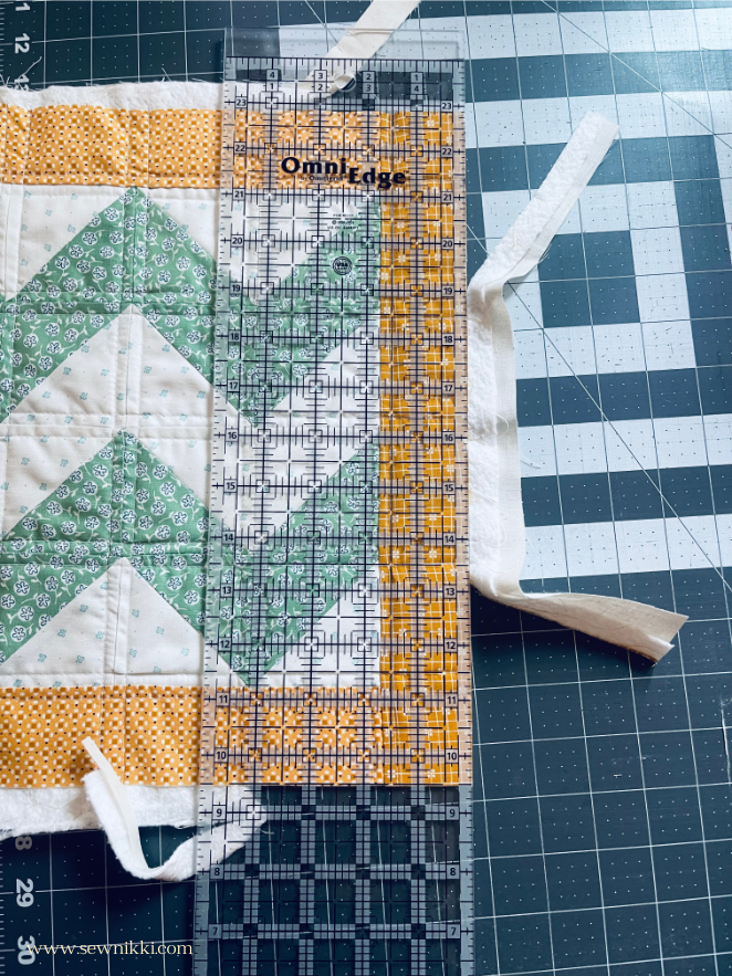 squaring up quilt top with straight ruler all on sides