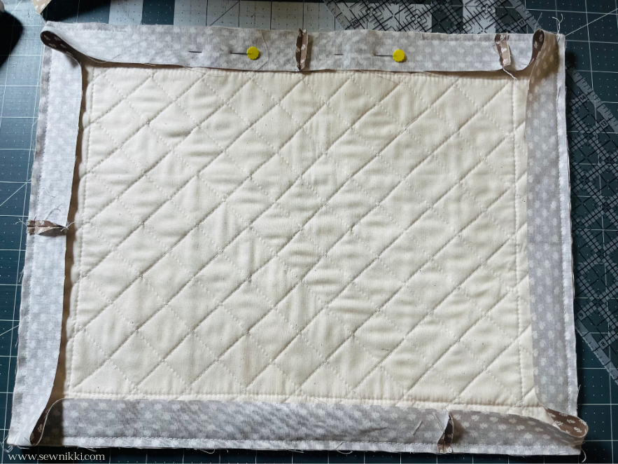 mini quilt patterns - attaching binding to quilted project