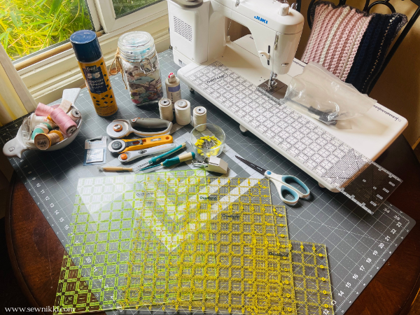 quilting and sewing supplies to make a quilt