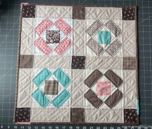 Table topper quilt I recreated by watching my sewing room video on YouTube