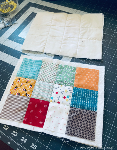 how to sew a handbag - quilted patchwork sides to bag on cutting mat