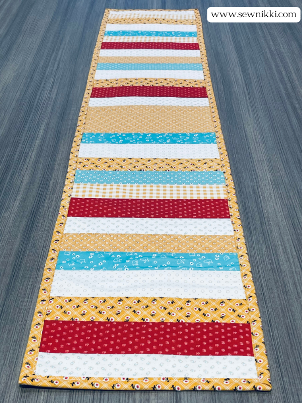 Quilt as you go patterns - Table Runner Free Pattern by Sew Nikki (front of quilt)