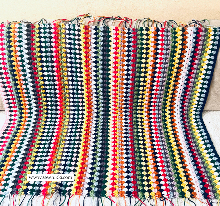 Easy Granny Stitch Crochet Blanket - Rows all done, need to weave tails by Sew Nikki.
