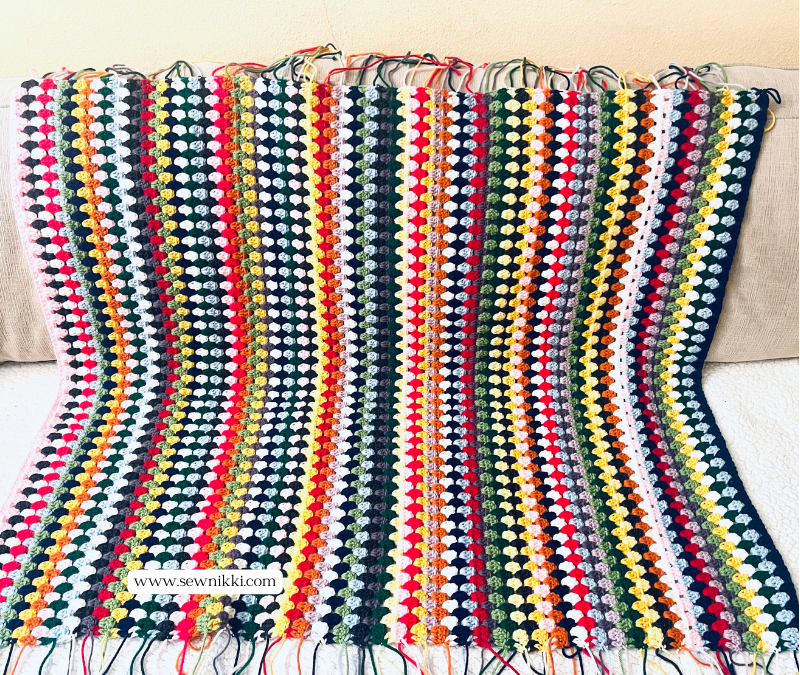 Easy Granny Stitch Crochet Blanket - Rows all done, need to weave tails by Sew Nikki.