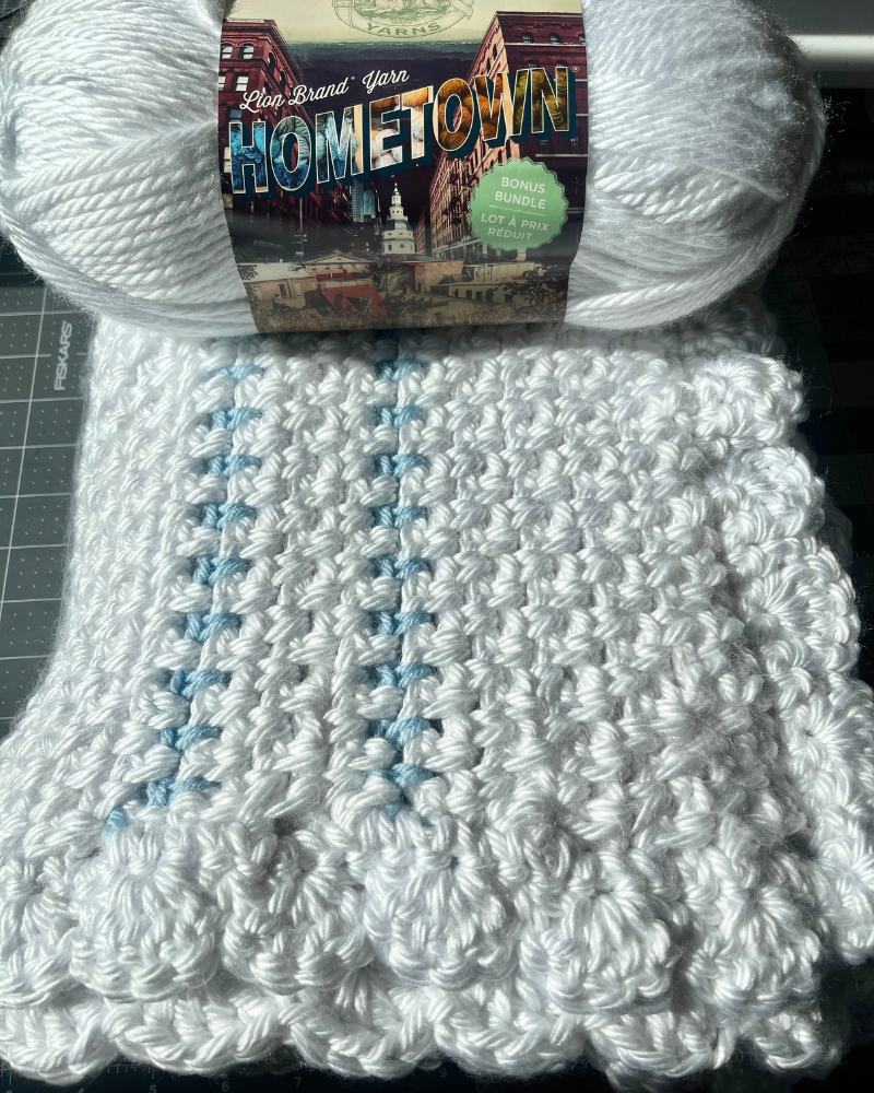 Easy baby blanket crochet - Lion Brand Hometown Super Bulky Yarn by Sew Nikki.