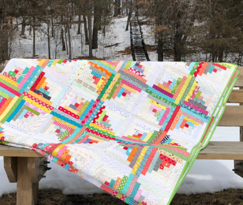 Log cabin quilt with diamond design by Crazy Mom Quilts.