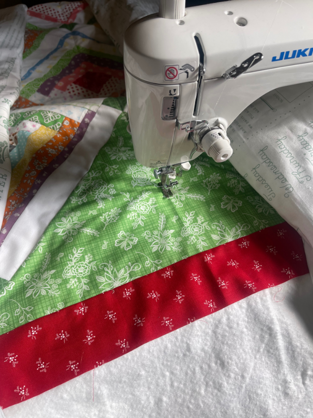 How to quilt on a regular sewing machine by Sew Nikki - quilt all the way down until you are on the batting, then stop.