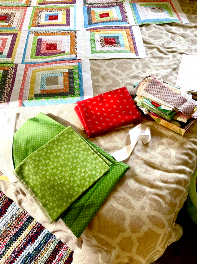 Log Cabin Quilt Patterns - Trying to select fabric for setting triangles and border by Sew Nikki.