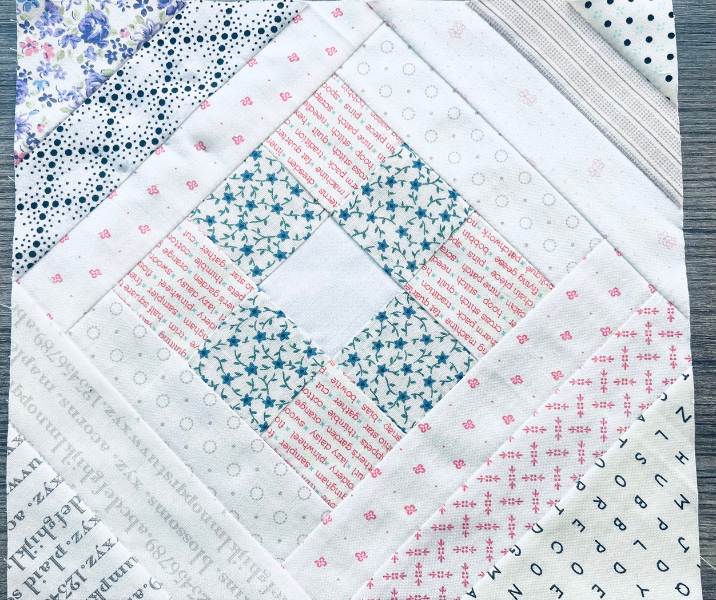 My favorite scrappy block is on point because it creates a secondary design when you join blocks together by Sew Nikki.