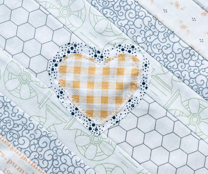 Scrappy double heart sewn right onto block, no interfacing by Sew Nikki.