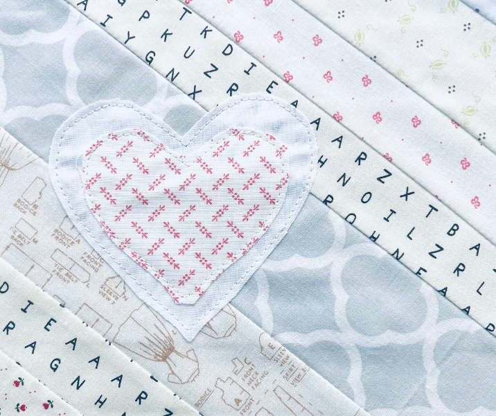 Scrappy Quilt Ideas - make a valentines quilt with these easy hearts sewn right onto your quilt block by Sew Nikki.
