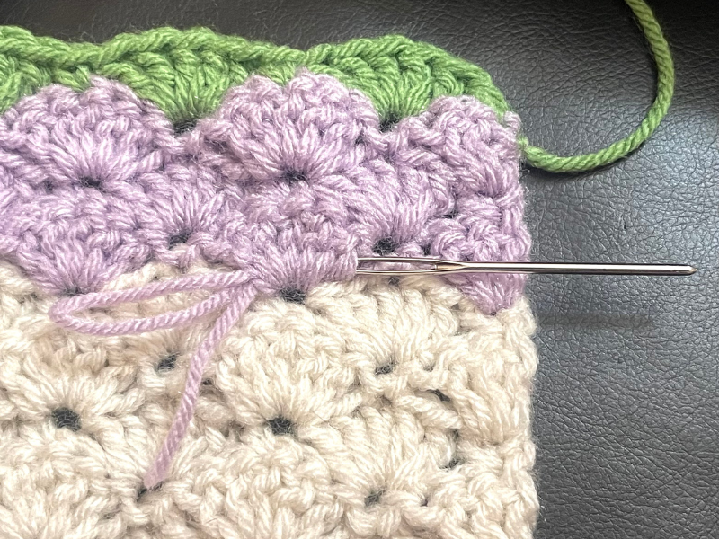 Free crochet pattern by Sew Nikki - weaving in a tail.