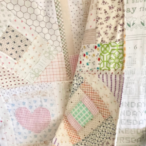 DIY Patchwork Receiving Blanket by Sew Nikki - Closeup of blanket top.