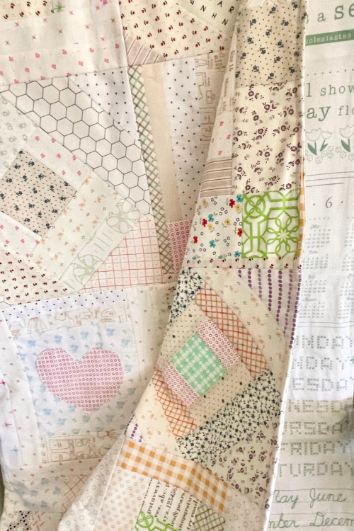 DIY Patchwork Receiving Blanket by Sew Nikki - Closeup of blanket top.