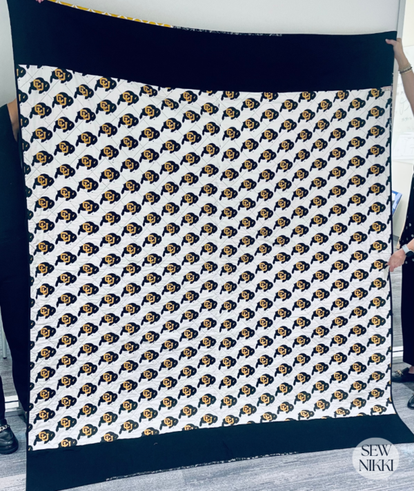 Design your own fabric with Spoonflower by Sew Nikki - Luca's Big Stars college quilt pieced custom backing.