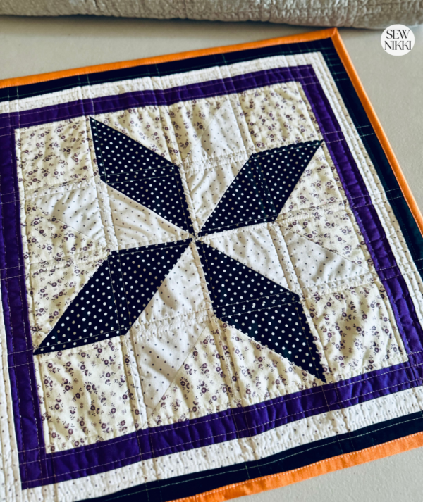 Halloween quilted table runner pattern - block layout sample by Sew Nikki.