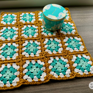 granny square table runner with JAYG crochet border by Sew Nikki