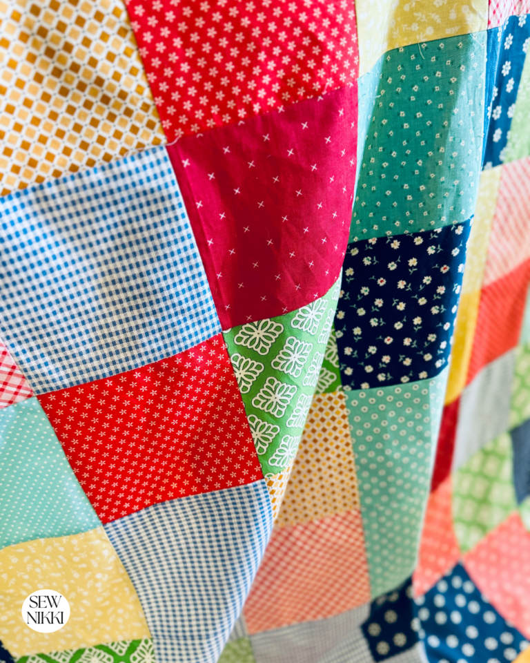 How to Sew a Double Sided Blanket - charm square blanket by Sew Nikki.