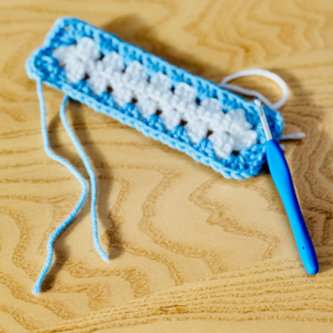 Granny rectangle foundation and first round by Sew Nikki.