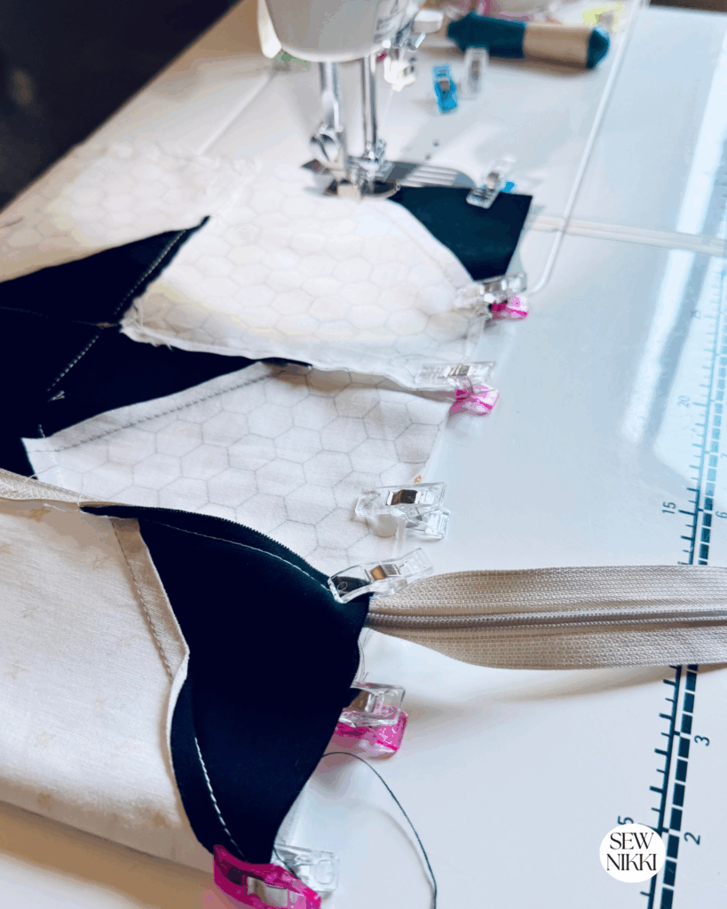 Sewing around the pillow cover on all sides but the zippered side by Sew Nikki