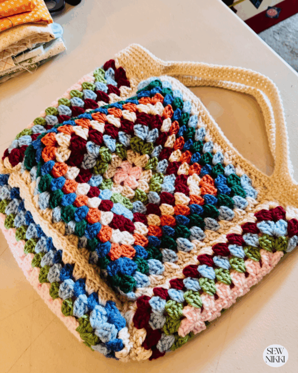 Top crochet edge and crochet handles added to the bag, it's all done by Sew Nikki.