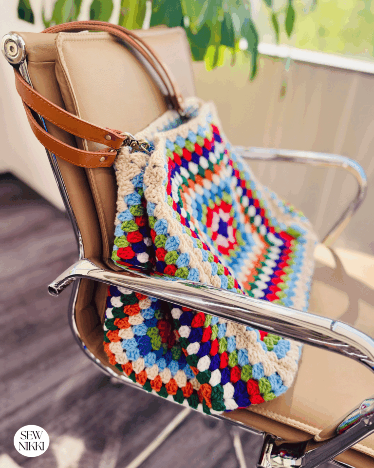 crochet bag accessory on this shoulder bag