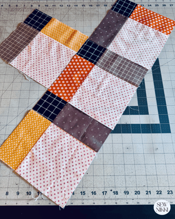 Setting quilt blocks on point, the first two rows without the setting triangles by Sew Nikki