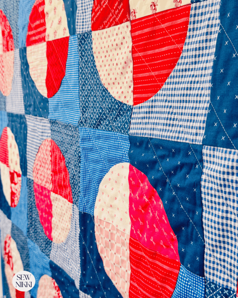 Up close side view of this scrappy modern quilt pattern by Sew Nikki.