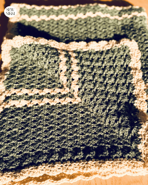 Free Pattern - Folded Iris Stitch baby blanket with the shell border by Sew Nikki