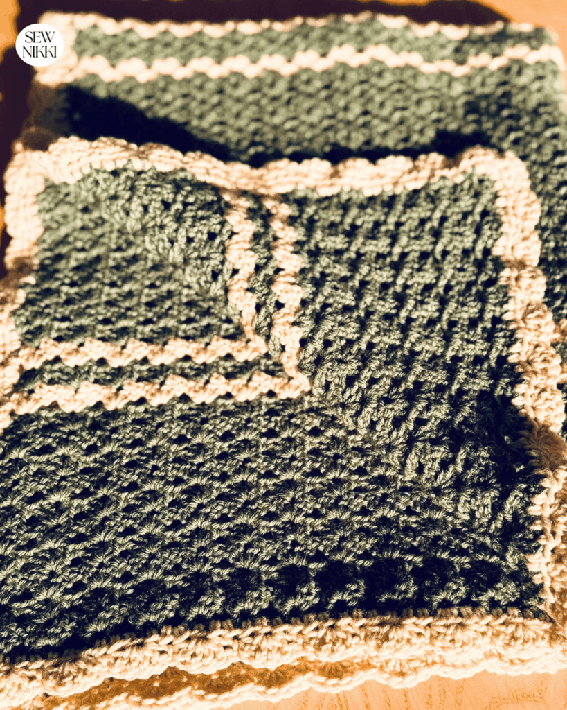 Free Pattern - Folded Iris Stitch baby blanket with the shell border by Sew Nikki