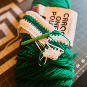 Doesn't take much yarn to make this easy double crochet scarf pattern by Sew Nikki