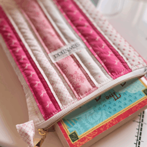 Finished quilted zippered book sleeve free sewing pattern by Sew Nikki