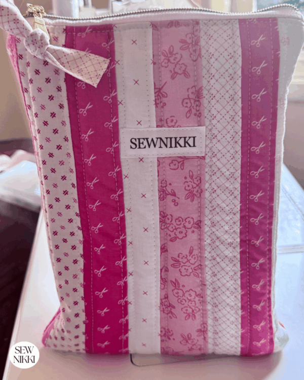Free Patchwork Book Sleeve Sewing Pattern by Sew Nikki - finished sleeve standing upright.