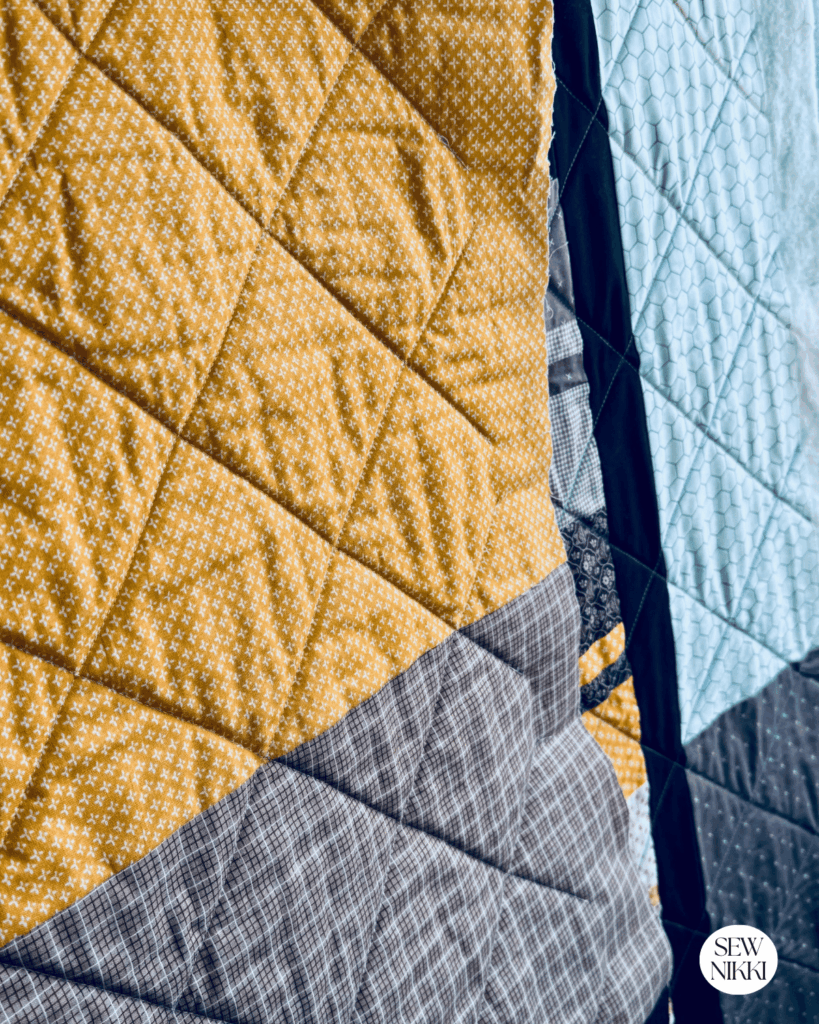 Backside of the Bella Quilt with the crosshatch quilting design by Sew Nikki