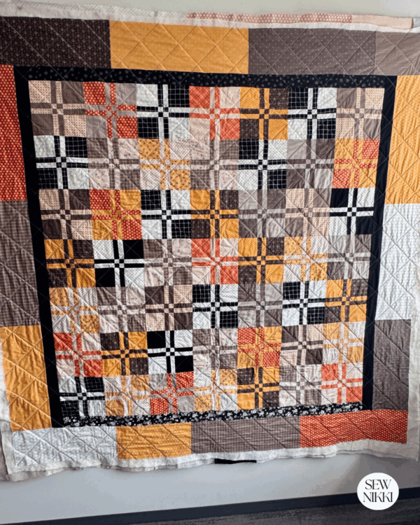 Bella Quilt with edge to edge quilting designs by Sew Nikki, still need to trim and bind.