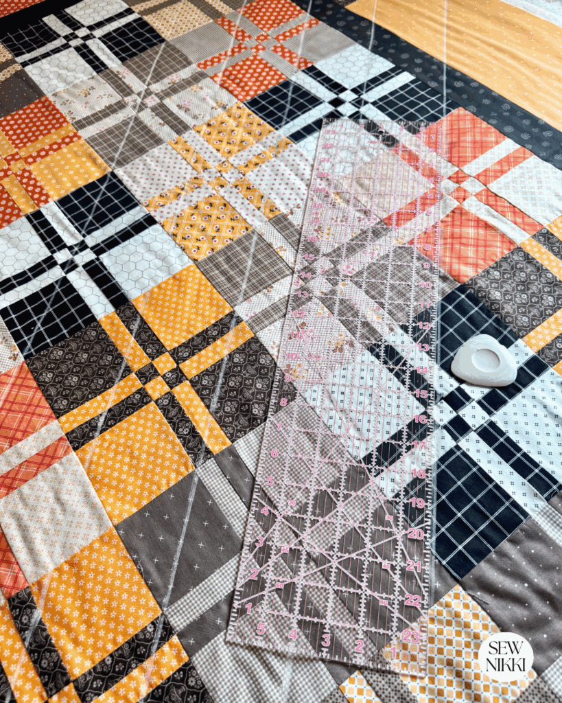 Edge to edge quilting designs using home machine, ruler and chalk by Sew Nikki