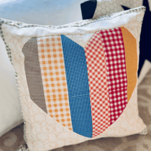 Finished Patchwork Striped Heart Pillow by Sew Nikki