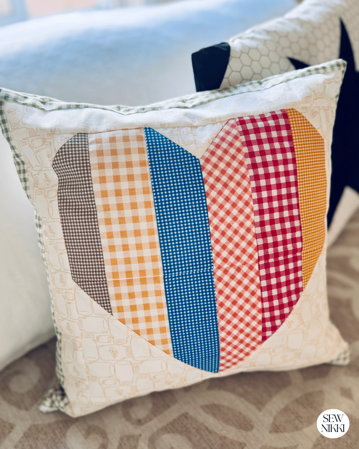 Finished Patchwork Striped Heart Pillow by Sew Nikki