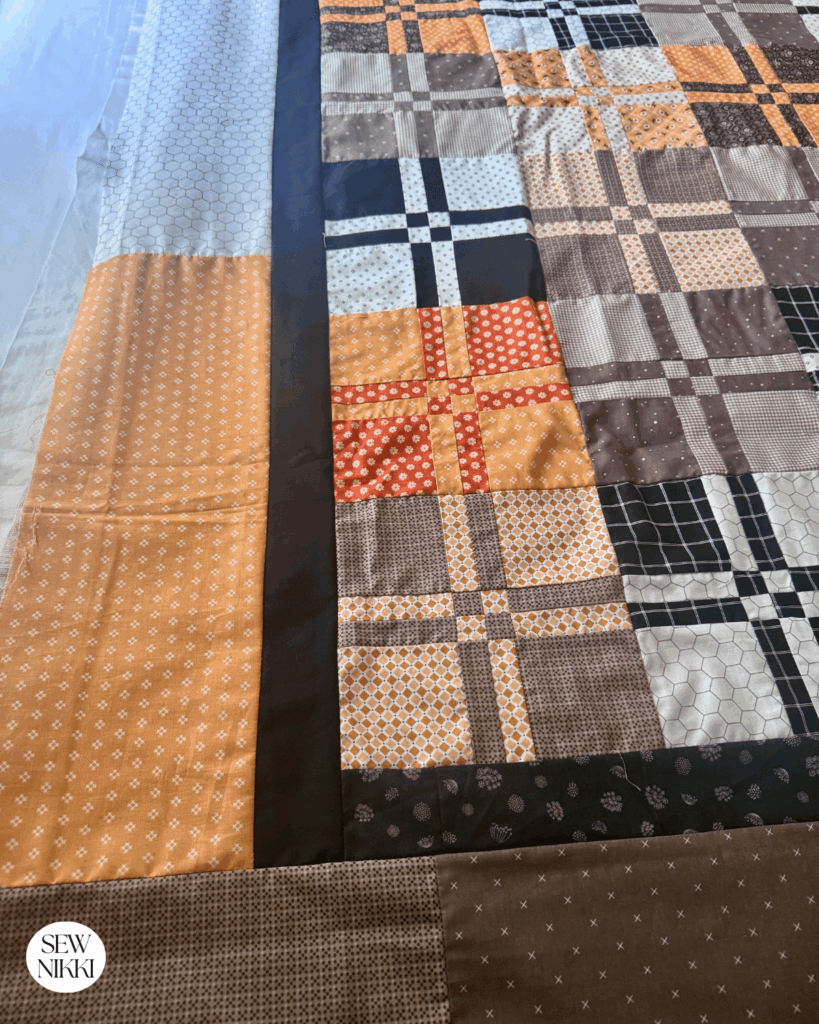Scrappy double border on the Bella Throw free quilt pattern by Sew Nikki
