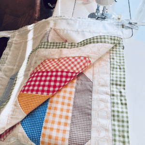 Attaching the back panel to the zipper by Sew Nikki