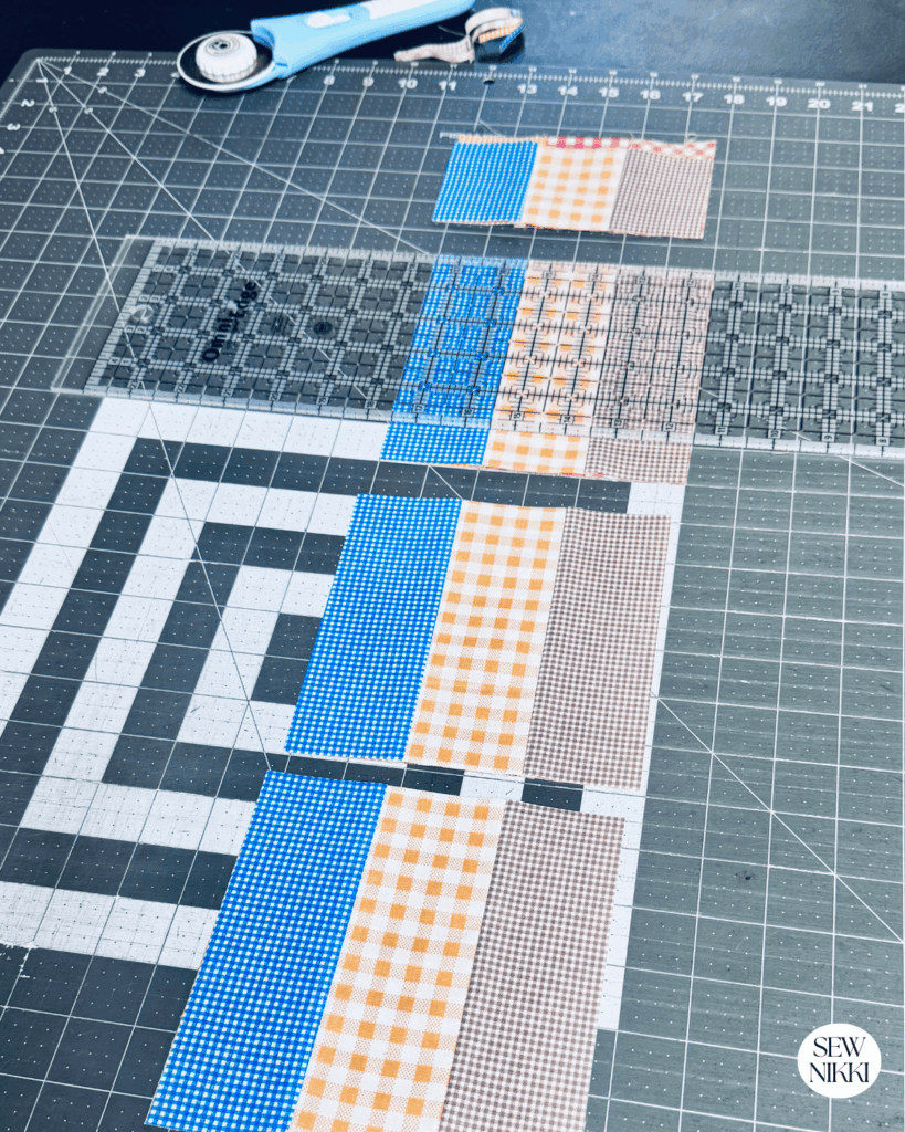 Sub cutting the strips into squares by Sew Nikki