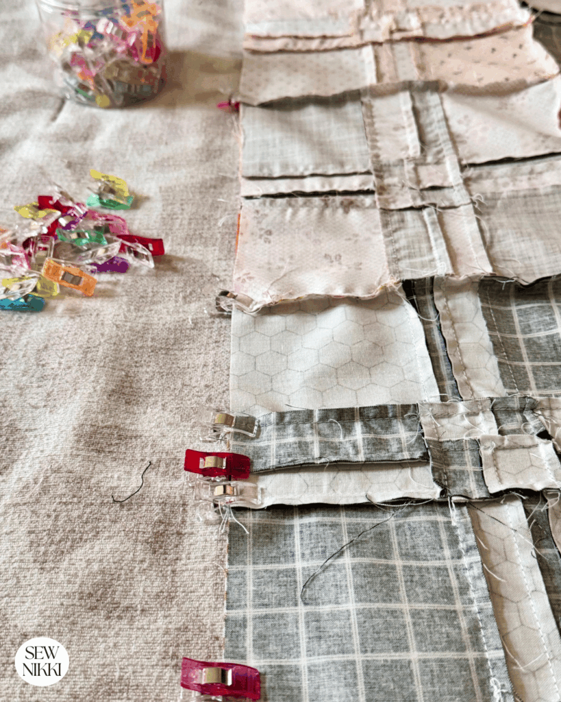 Use sewing clips to secure your nested seams without pricking you like sewing pins do by Sew Nikki