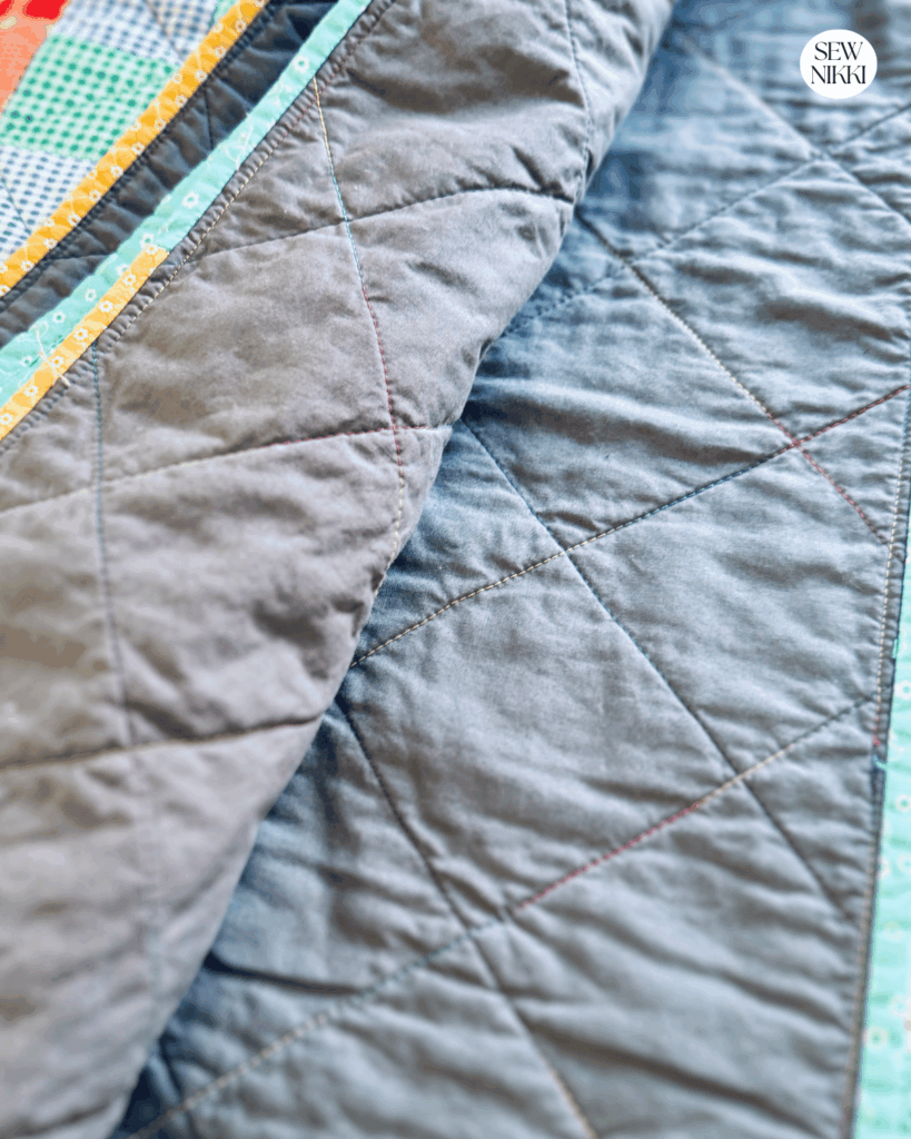 This multi colored thread is my go to for any scrappy quilt with colorful prints by Sew Nikki