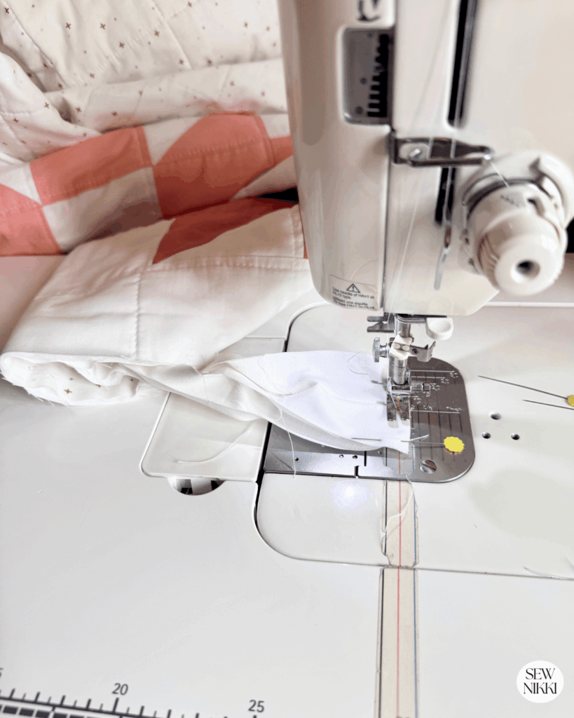 Joining quilt binding to finish my Sisters Choice free quilt pattern by Sew Nikki