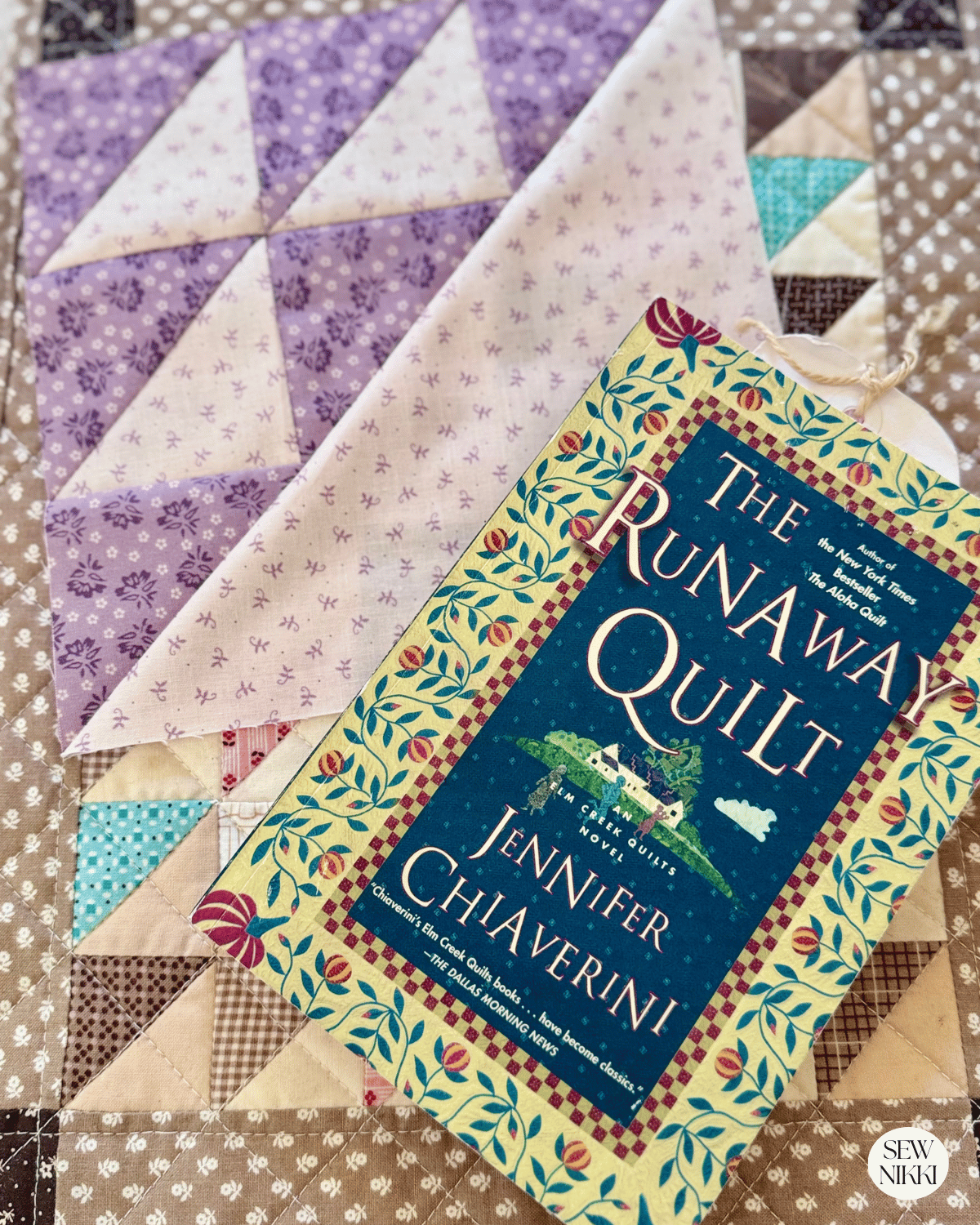 Birds in the Air quilt block pattern (free tutorial) by Sew Nikki - one finished block sitting with my book inspiration.